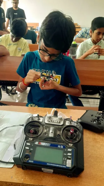 Student working with electronics and circuitry